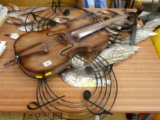 Metal violin hanging wall art and a metal geese hanging wall art