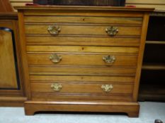 A vintage mahogany chest of two long and two short drawers with brass handles, 92cms wide