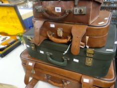 Parcel of four vintage suitcases including one small leather suitcase and two pictures ETC