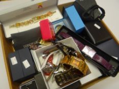 A large quantity of loose and cased ladies fashion watches