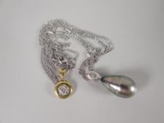An 18ct white gold necklace with marquise believed diamond together with a 9ct yellow gold and