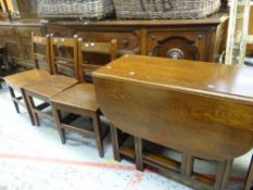 A good vintage reproduction drop leaf oak gate table with end drawer together with three oak