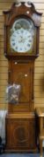 An antique inlaid mixed wood Victorian grandfather clock having a painted rolling moon dial, eight-