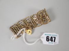 A 9ct yellow gold gate bracelet with tapered ends and attached heart-shaped pad-lock, 16gms Please