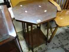 A vintage Arts & Crafts style hexagonal two-tier vintage table