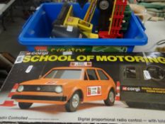 A vintage boxed Corgi remote control 'School of Motoring' car together with a collection of loose