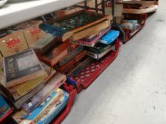 A large collection of vintage boxed games including two vintage bagatelles