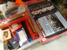 A large collection of 00 gauge model railway including trains, coaches and rolling stock together