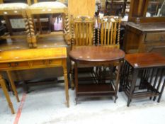 A reproduction yew wood small console table, mahogany nest of four tables and another table