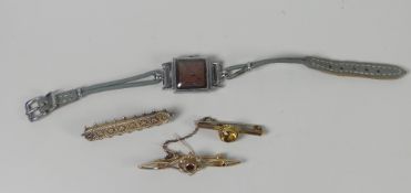 Three 9ct yellow gold bar brooches and a vintage ladies chrome encased wristwatch Please note: not