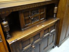 A reproduction Jacobean-style carved oak court cupboard, 125cms wide Condition reports provided on
