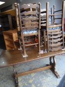 A good reproduction Jaycee oak refectory table and four matching ladder back drop in cushion