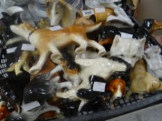 A quantity of pottery dog figures