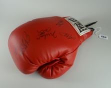 Red Everlast boxing glove individually signed by five world heavyweight boxing champions, Muhammad