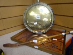 A brass bed warming pan, riding crop, framed copper map of South Wales