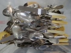 Plastic tub of loose flatware