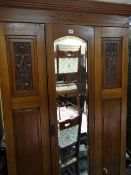 Vintage lightwood mirrored wardrobe with carved panels and base drawer