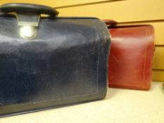 Two vintage leather overnight / travel cases