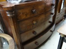 A Victorian bow front chest of three long and two short drawers