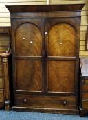 An antique mahogany two-door wardrobe with base drawer, 196 x 120cms
