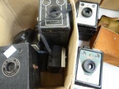 Collection of vintage cameras including a Coronet console, a Coronet ambassador, a Kodak Brownie