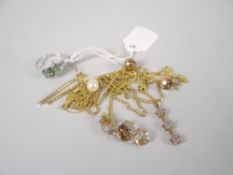 A parcel of mixed jewellery mainly 9ct yellow gold modern, including necklaces and pendants ETC,