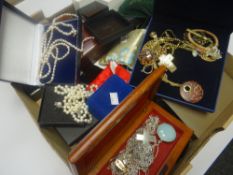 A large collection of modern jewellery mainly in pouches and boxes including beads, yellow metal