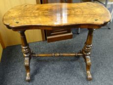 Late Victorian inlaid walnut shaped side table raised on turned legs with single turned stretcher,
