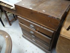A vintage four-drawer oak chest with two-door chest top and containing a selection of vintage