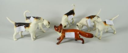 A six-piece Beswick fox & hound group