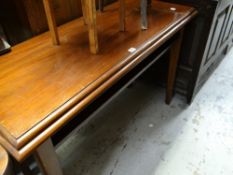 A vintage mahogany side table and two planter stands