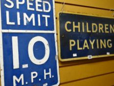 A vintage sign Children Playing and another Speed Limit 10 miles per hour