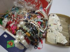 Box containing a large quantity of loose vintage cigarette cards together with large quantity of