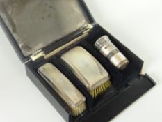 A fine quality machine turned Art Deco-style and monogrammed silver gentleman's vanity case