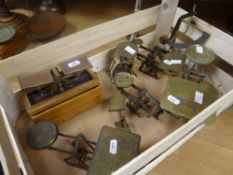 A collection of eight vintage brass postal scales