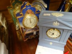 Wedgwood Jasperware, commemorative mantel clock together with three other mantel clocks