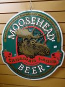 A Mooshead beer metal sign