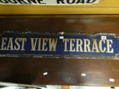 An antique enamel blue sign for Eastview Terrace