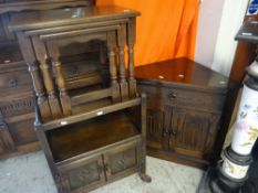 A reproduction Jaycee linenfold-style oak corner standing corner cupboard base with drawer and two-