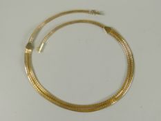 A modern yellow gold flat necklace, hallmark worn but believed to be 750 (not tested and not