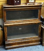 A vintage oak two-tier Globe Wernicke bookcase, 87cms wide
