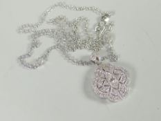A modern 18ct white gold Art Deco style portrait locket set with tiny diamonds and on 18ct white