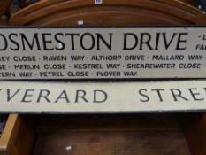 A street sign for Cosmeston Drive and tributaries, another for Everard Street