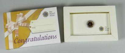 Royal Mint 2009 gold quarter sovereign, 2grams approx. in original box and sleeve
