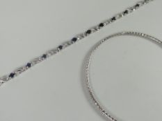 A 9ct white gold bracelet set with believed sapphires and tiny diamond chips, together with a