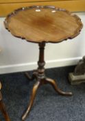A good antique tripod table with galleried shaped circular top