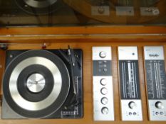 A retro standing Decasound compact 3 stereo system with record player and tuner
