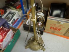 An ornate brass telescopic standard lamp together with a crate of metal and ceramic planters ETC