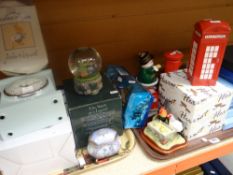 Boxed Wedgwood collectors plates, novelty money boxes, mantel clock ETC