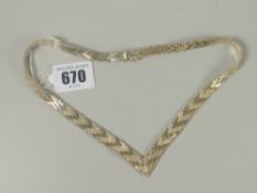 A 95 silver textured wish bone shaped flat necklace, 45grams Please note: not tested, hallmarks,